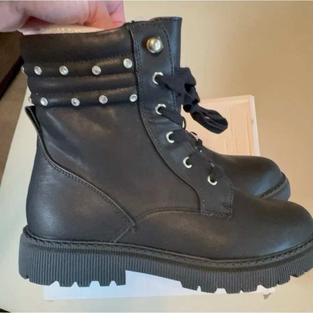 Youth girls size 5 DKNY black boots.